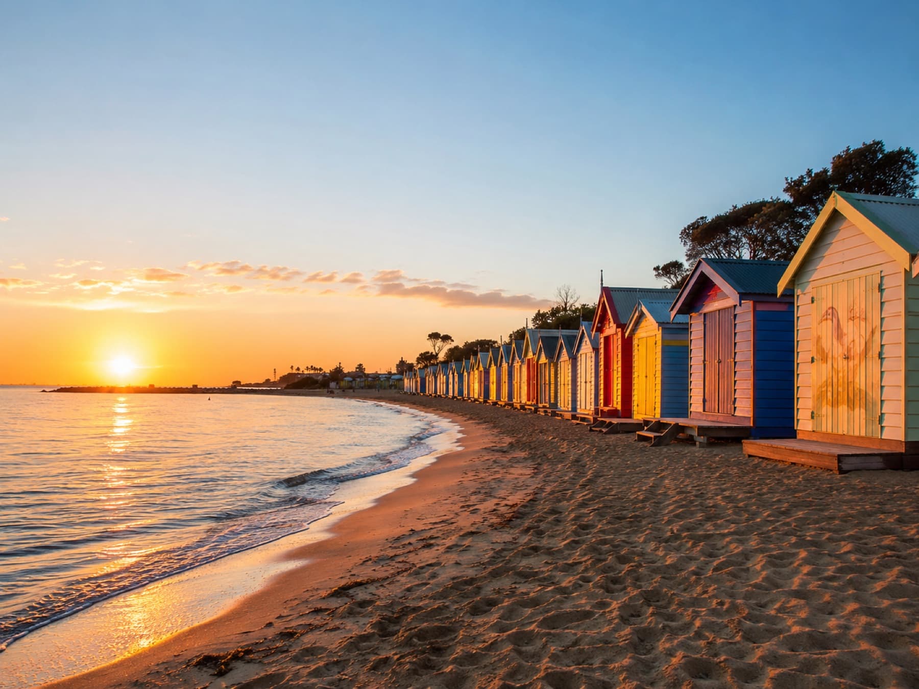 Brighton bathing boxes at sunset
